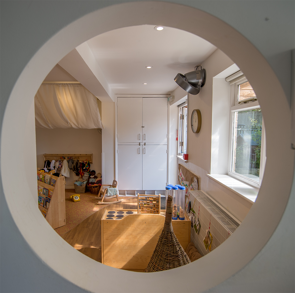 Indoor suite seen through a keyhole