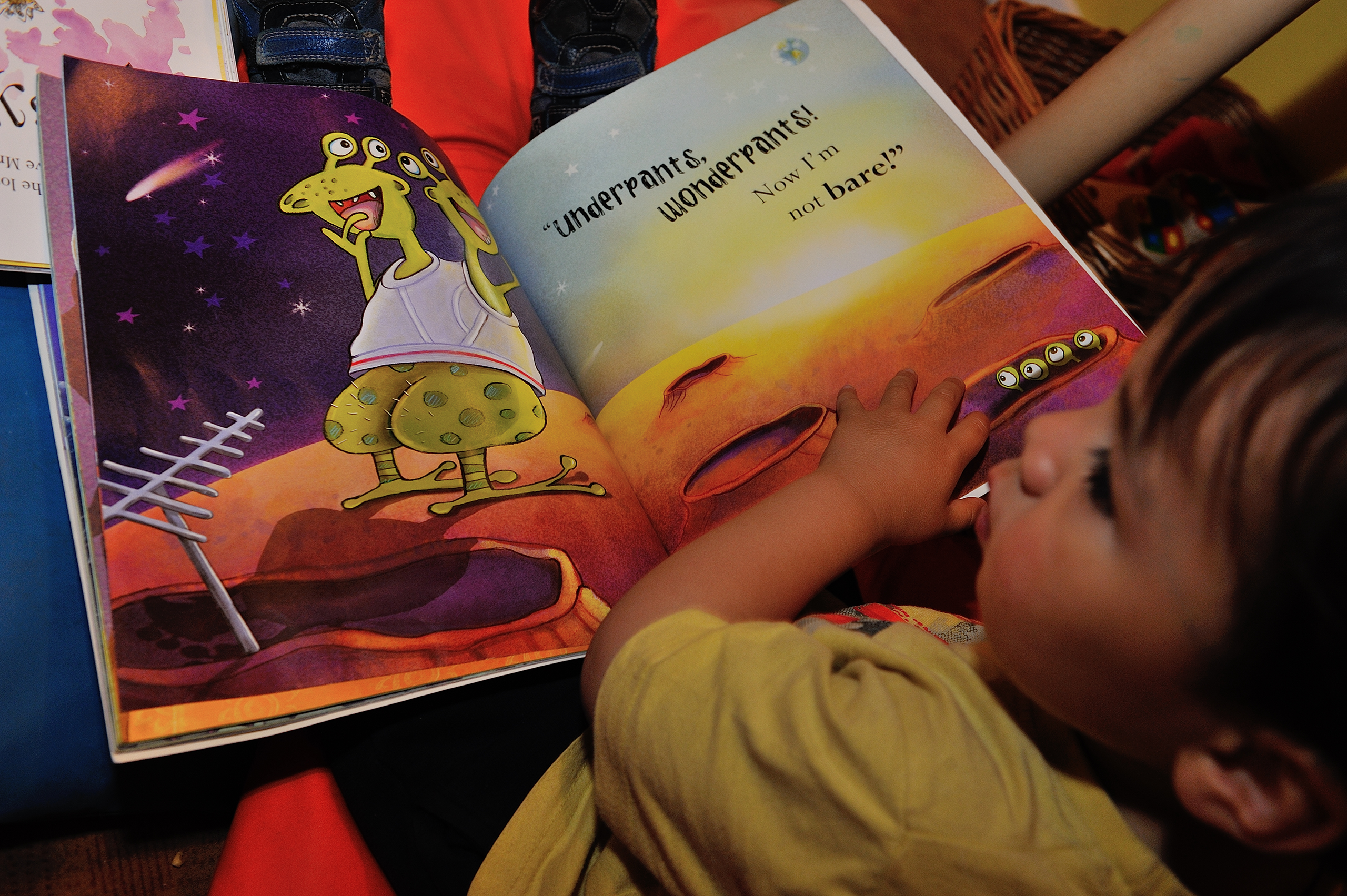 Child reading a children's book